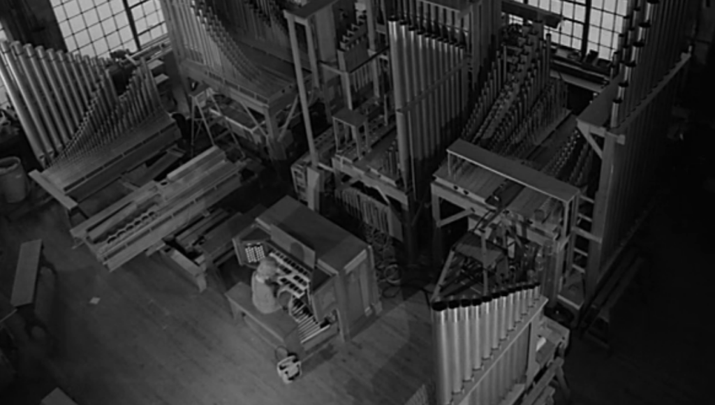 Mary playing the organ
