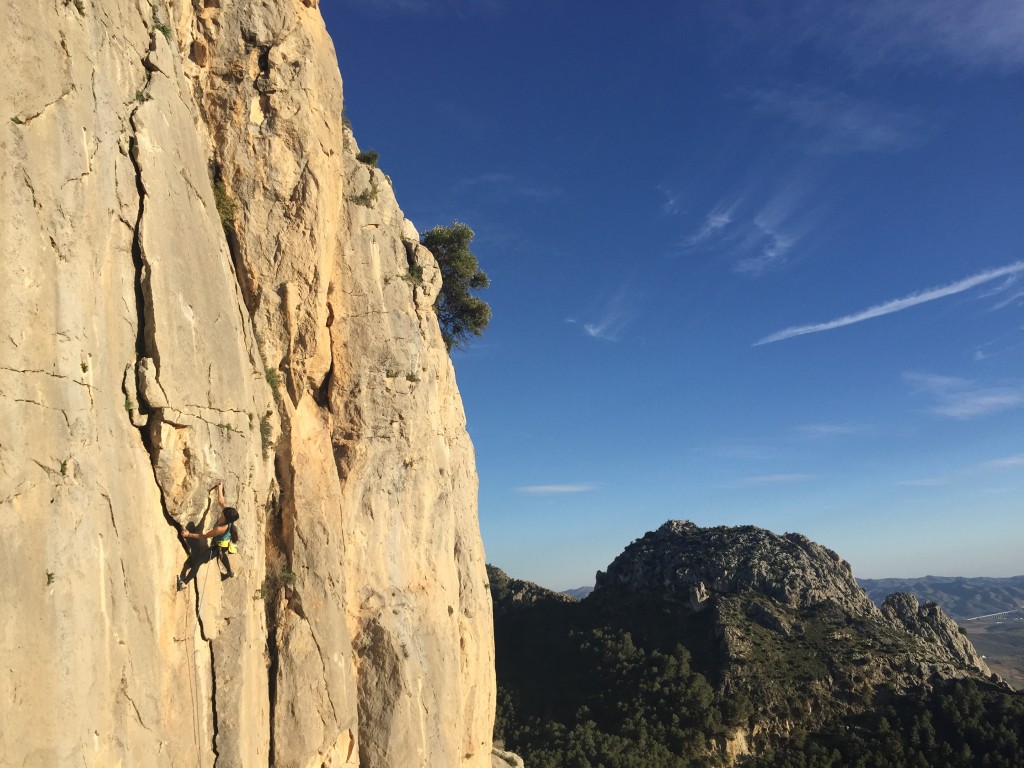 The author rock-climbing in Spain, Dec. 2014